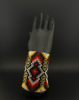 Red and Gold Beaded Yawanawa Cuff